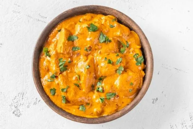 Butter Chicken - creamy curry at Curries and Puffs Edmonton